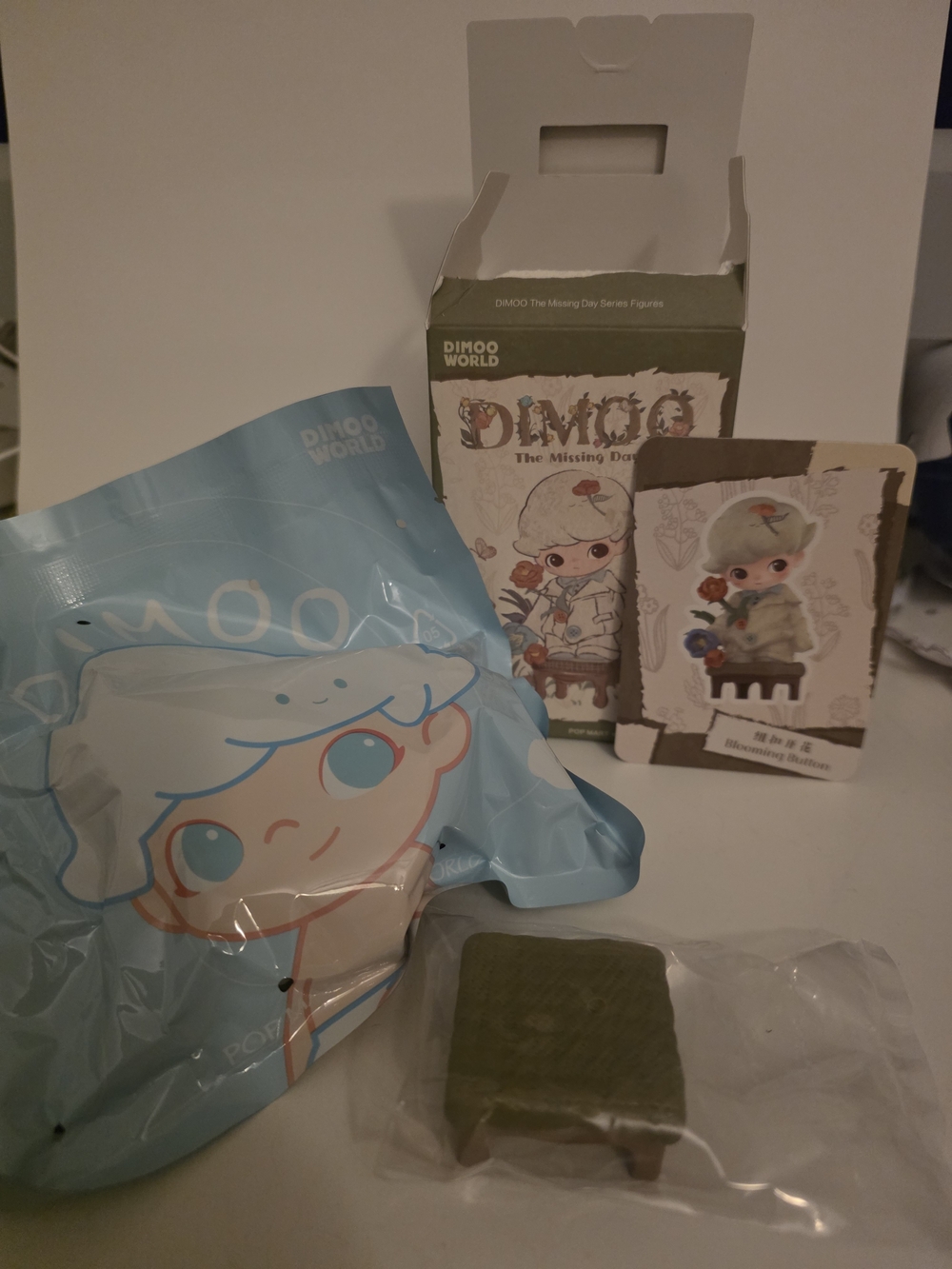 POPMART DIMOO THE MISSING DAY SERIES FIGURINE - BLOOMING BUTTON